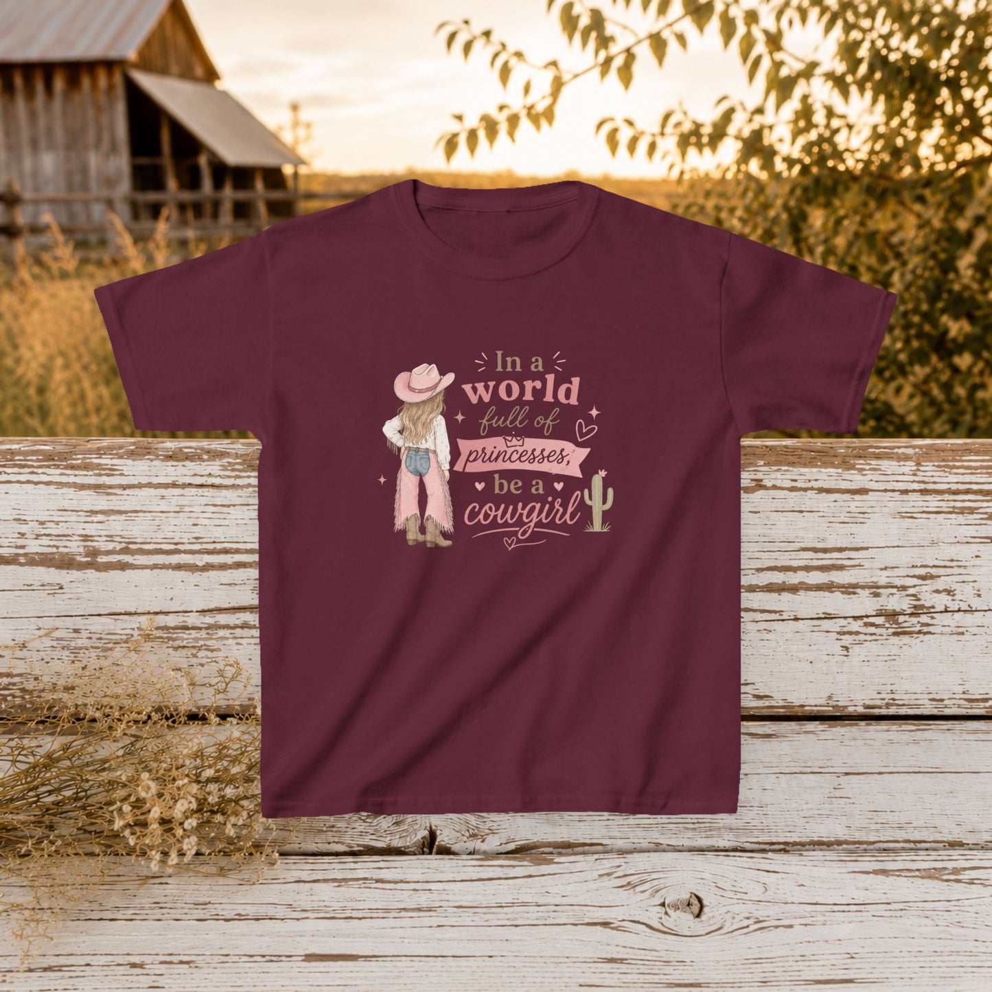 "In a world full of princesses be a cowgirl" Pink Western Graphic - Kids Tee