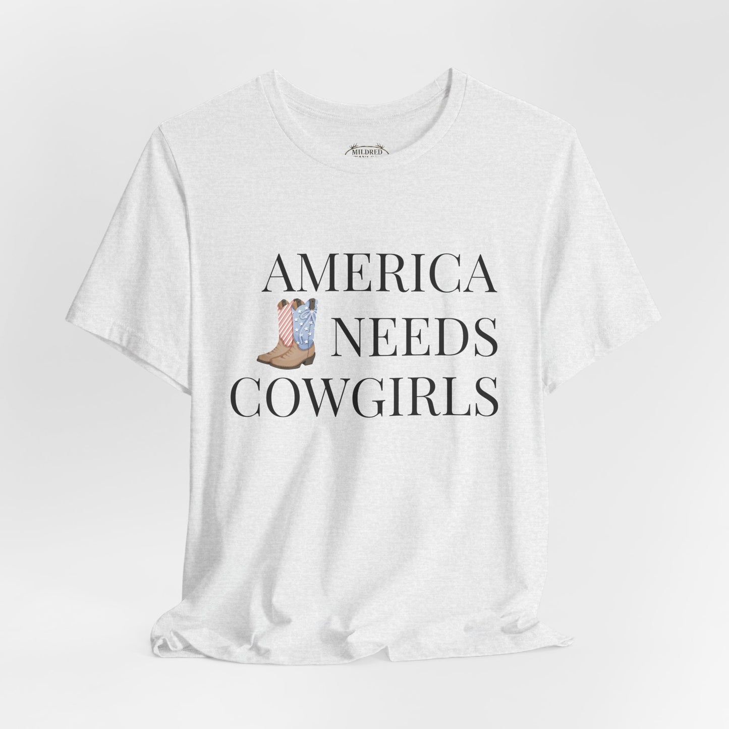 America Needs Cowgirls Tee — Cowboy Boots Graphic Shirt