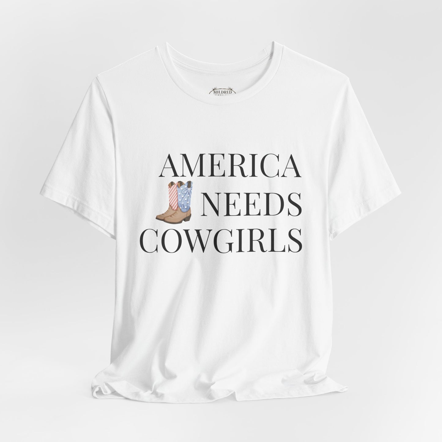 America Needs Cowgirls Tee — Cowboy Boots Graphic Shirt