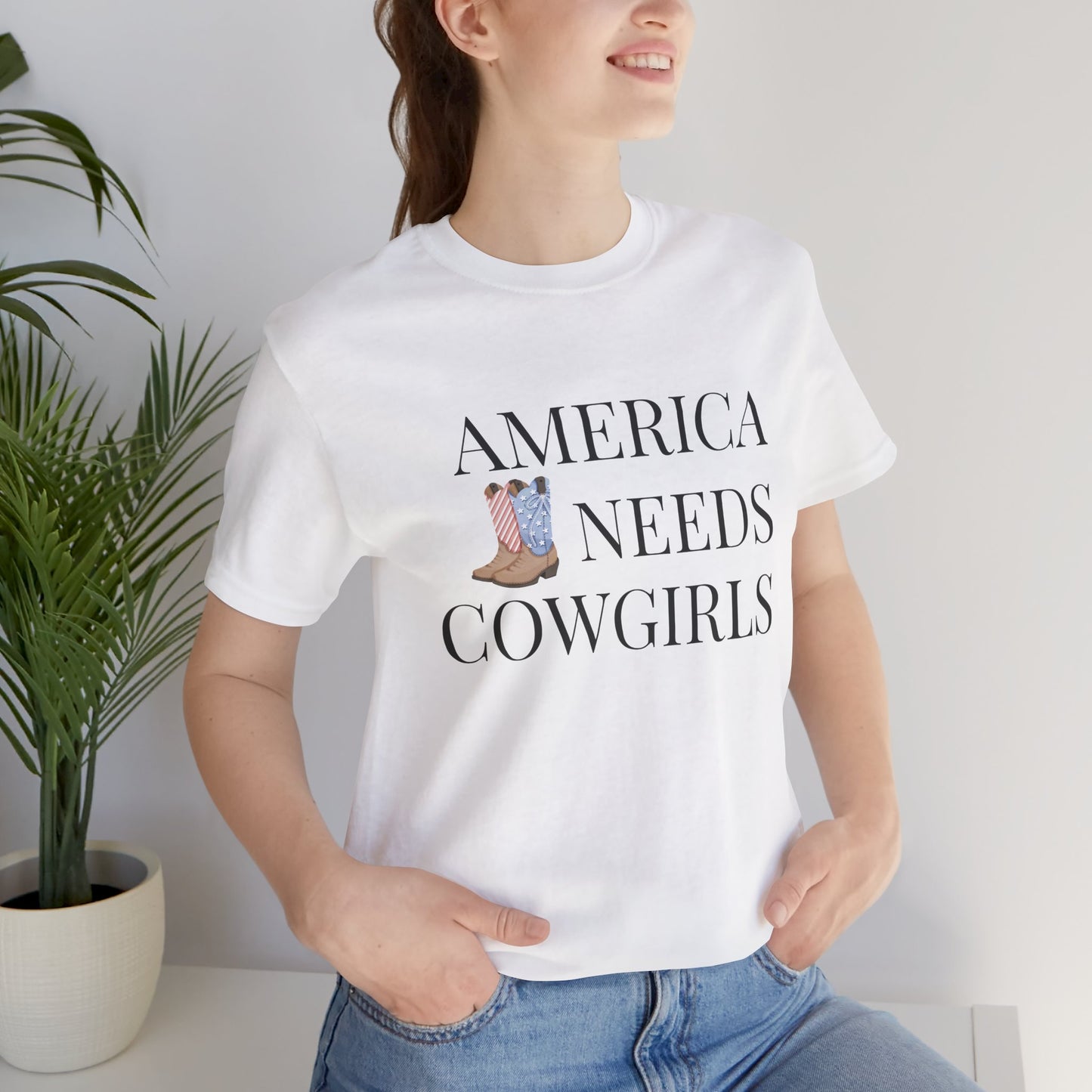 America Needs Cowgirls Tee — Cowboy Boots Graphic Shirt