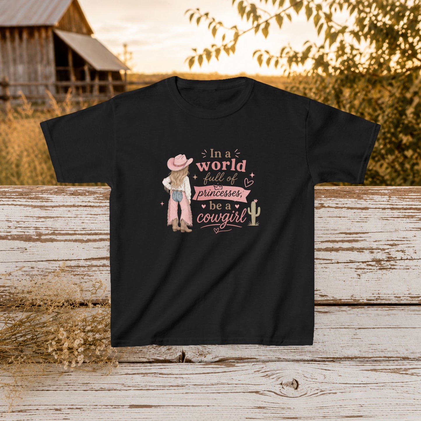 "In a world full of princesses be a cowgirl" Pink Western Graphic - Kids Tee