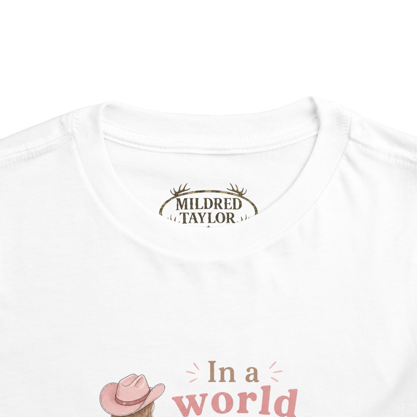 Toddler Cowgirl Tee — "In a World Full of Princesses, Be a Cowgirl" Pink Western Shirt