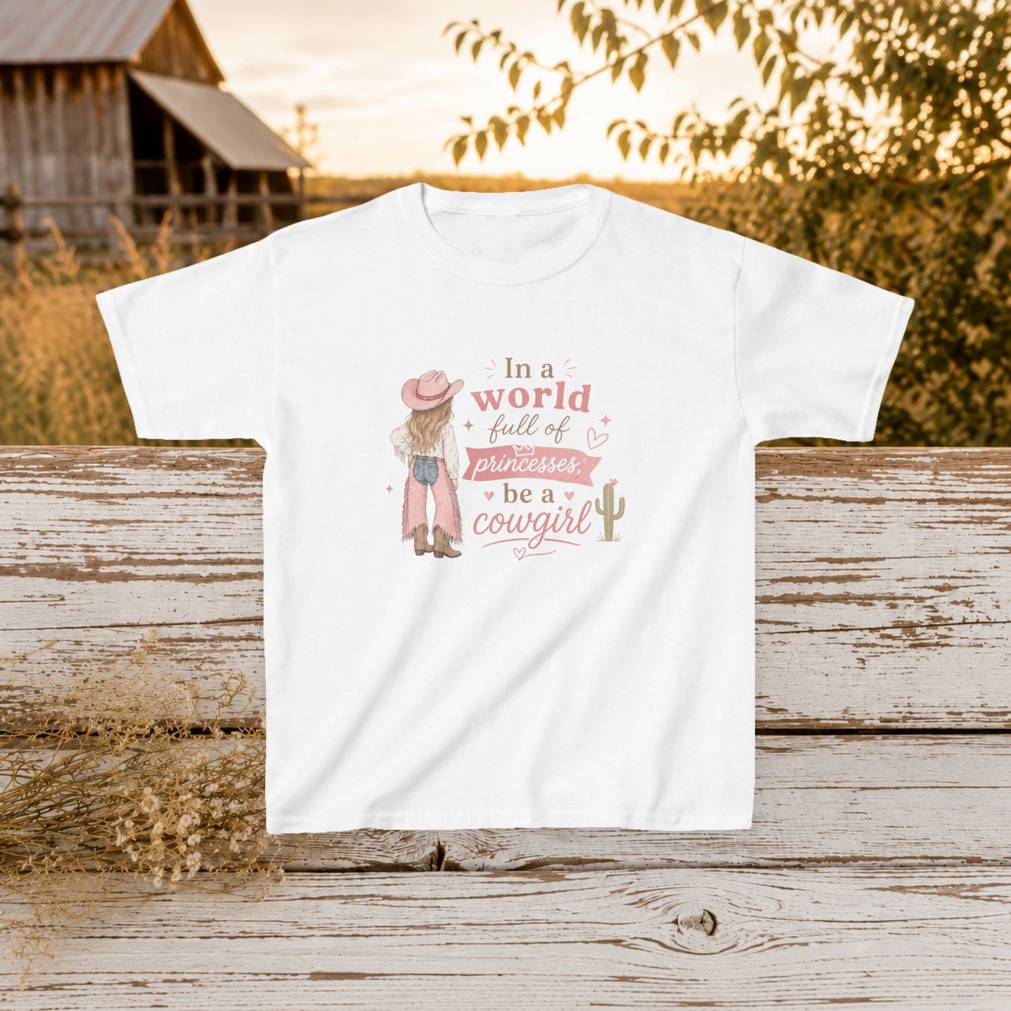 "In a world full of princesses be a cowgirl" Pink Western Graphic - Kids Tee