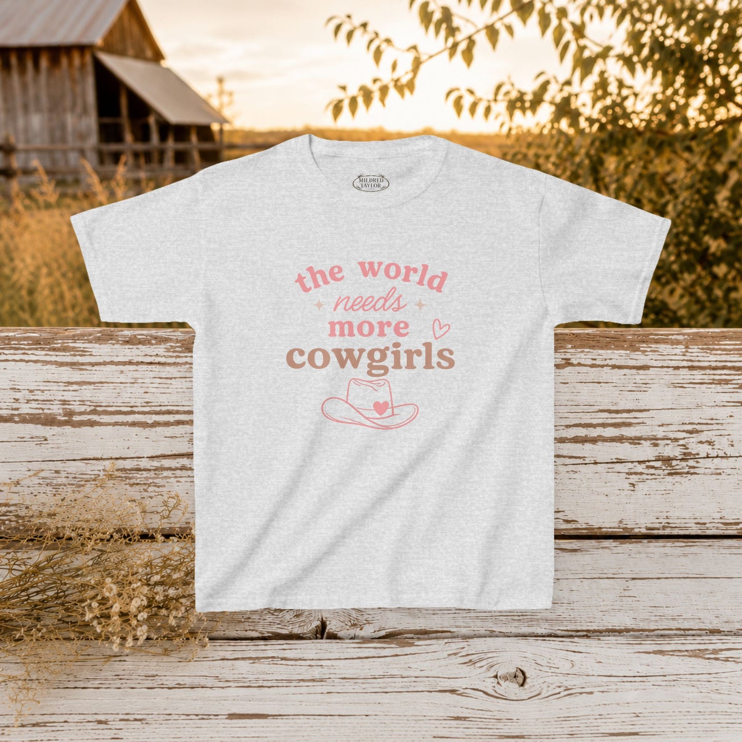 “The World Needs More Cowgirls” Pink Cowgirl Graphic - Kids Tee