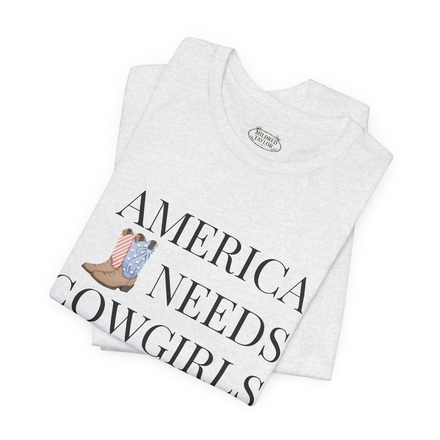 America Needs Cowgirls Tee — Cowboy Boots Graphic Shirt