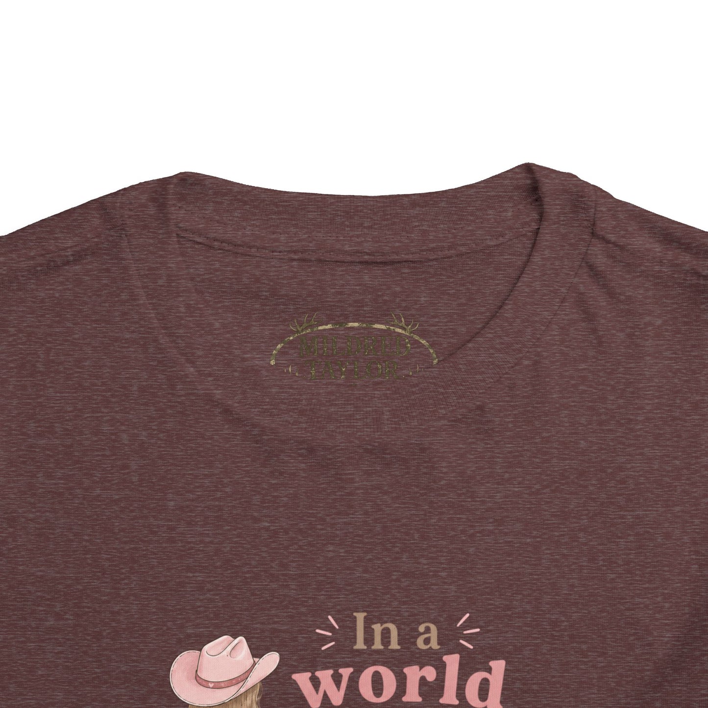 Toddler Cowgirl Tee — "In a World Full of Princesses, Be a Cowgirl" Pink Western Shirt