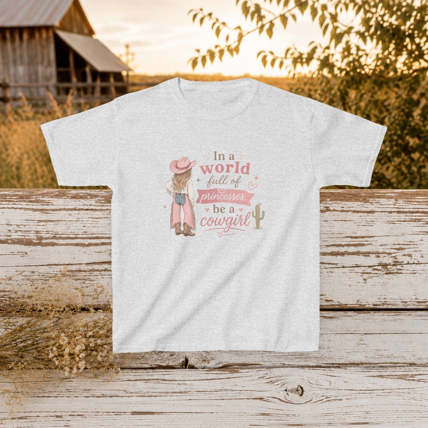 "In a world full of princesses be a cowgirl" Pink Western Graphic - Kids Tee